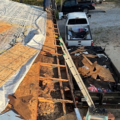 Roof tear-off in progress by GRS Roofing